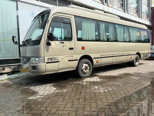 34 مقعدًا تستخدم حافلة كوستر حافلة صغيرة XML6809 مع توجيه اليد اليسرى للمحرك الكهربائي