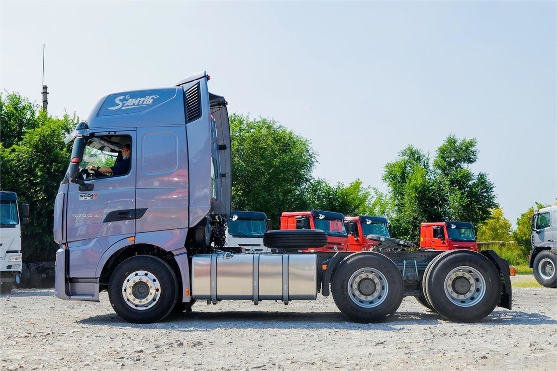 HOWO TH7 شاحنة 610HP 6 * 4 AMT أوتوماتيكية البضائع الخطرة الجرار شاحنة رفيعة المزاح