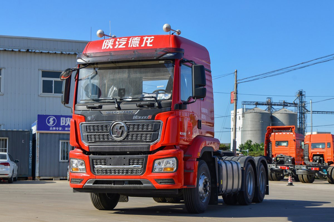 سقف مرتفع مرفق أربع نقاط تعليق كيس الهواء مقعد 430HP 6 * 4 M3000s شاكمان شاحنة الجرار