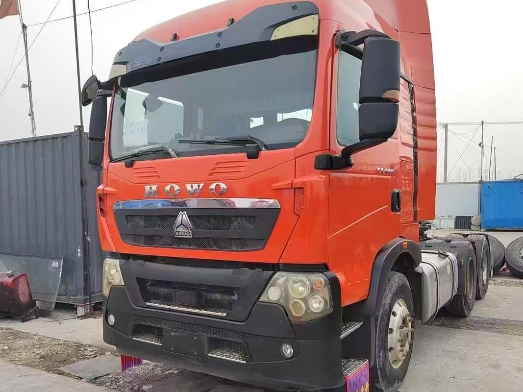 شاحنة سينو Howo MAN محرك 460 حصان 2021 سنة 6 × 4 وضع القيادة HowoTX رأس الجرار سقف مرتفع مع سرير