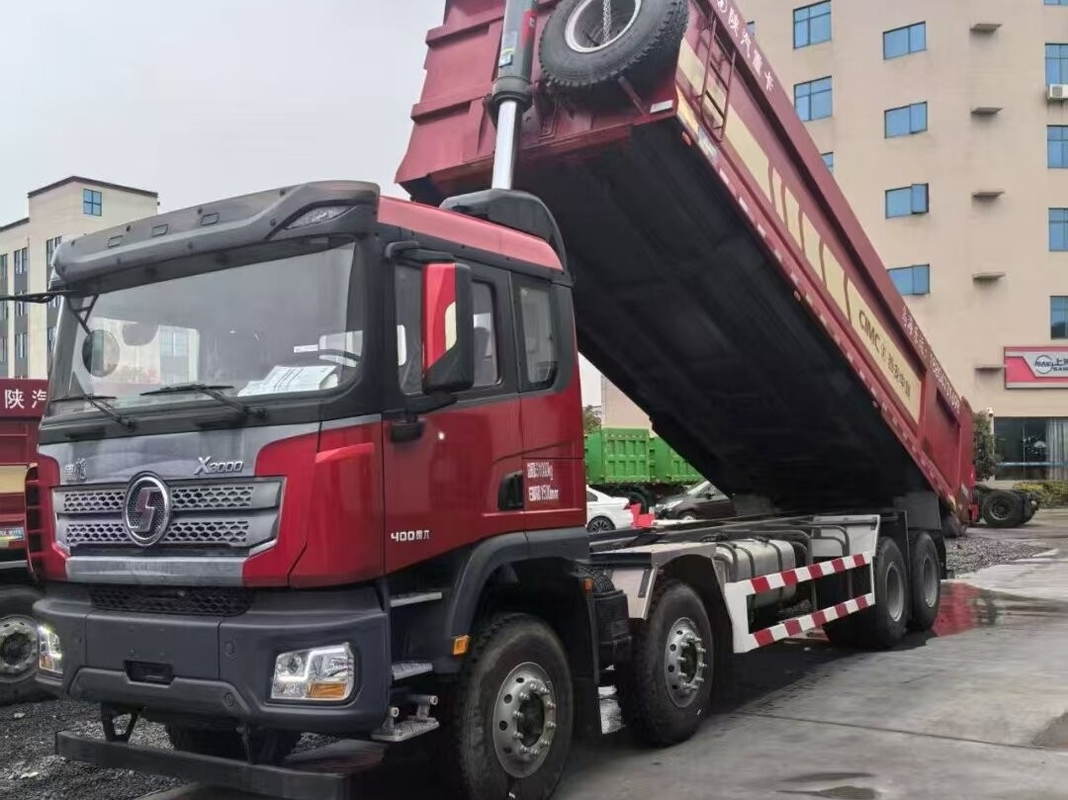 الشاحنة المستخدمة للغم Shacman Weichai 430hp رفع الأمامي 8 * 4 وضع القيادة 12 الإطارات Lhd 50 طن تحميل