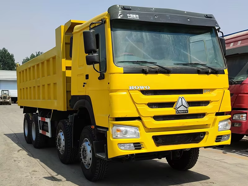 تستخدم Howo Dump Truck 371hp 8x4 محرك اليد اليسرى محرك الديزل WP AC 12 عجلات لزيمبابوي