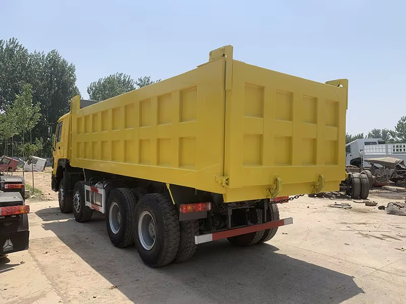 تستخدم Howo Dump Truck 371hp 8x4 محرك اليد اليسرى محرك الديزل WP AC 12 عجلات لزيمبابوي