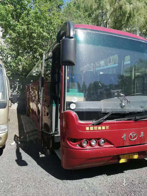 حافلة Youngman مستعملة هيكل NEOPLAN 48 مقعدًا وسادة هوائية مزدوجة الأبواب محرك خلفي يسار يستخدم حافلة ركاب